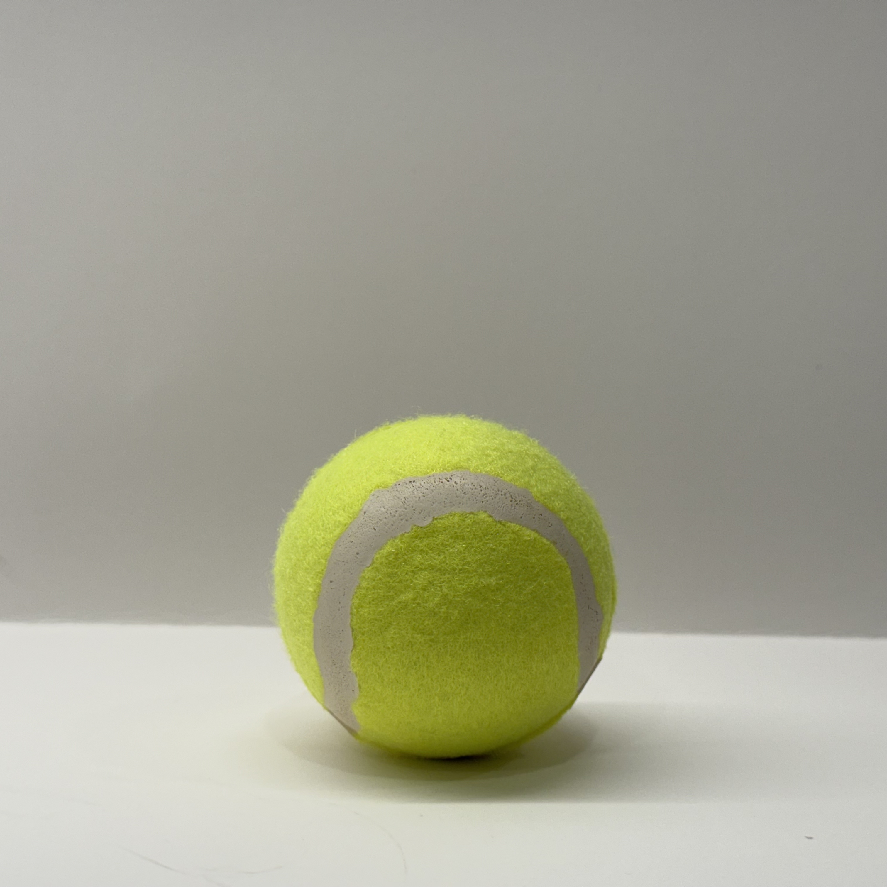 Tennis ball top